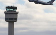 505px-Melbourne_airport_control_tower_and_united_B747.jpg